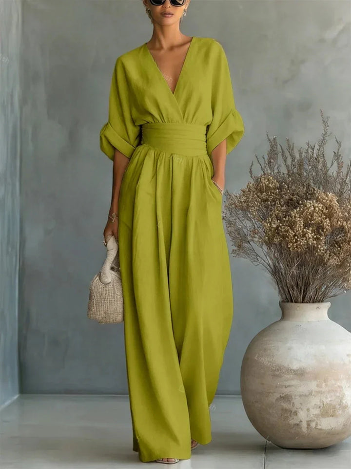 Elegante mono con escote en V, cintura alta y pierna ancha